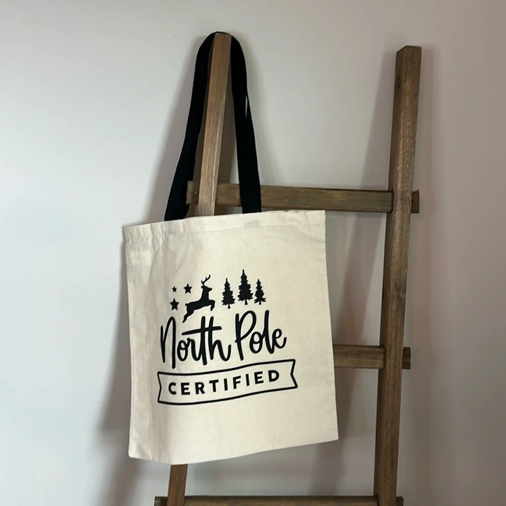 Sarnico Designs Cream Tote Bag with Black Vinyl North Pole Certified Design New